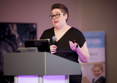 Angharad Welch talking at the lecturn at SENsible24 SENCO Conference.
