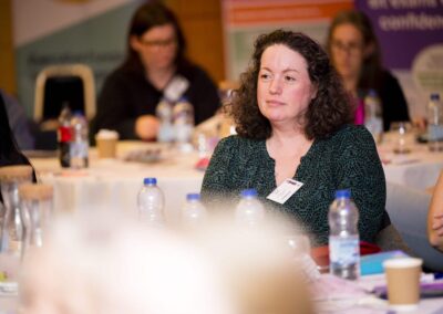 A SENCO sitting at the table listening at SENsible24 SENCO Conference