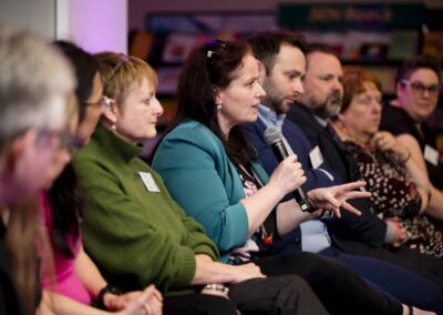 SENsible24 SENCO conference speakers all in a line with the microphone in the SENDcast Live session
